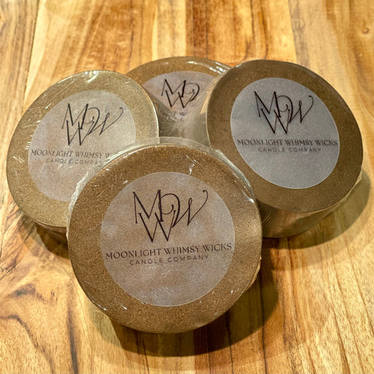Handcrafted round goat's milk soap bar on an elegant wooden cutting board, showcasing its premium quality and organic ingredients for a luxurious skincare experience.
