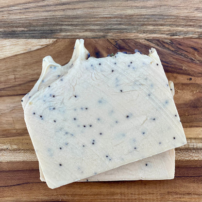 Handmade cold processed exfoliating soap bar with natural poppy seeds, crafted by Moonlight Whimsy Wicks. Soap for gentle exfoliation and moisturizing skincare, made in small batches for sensitive and dry skin.
