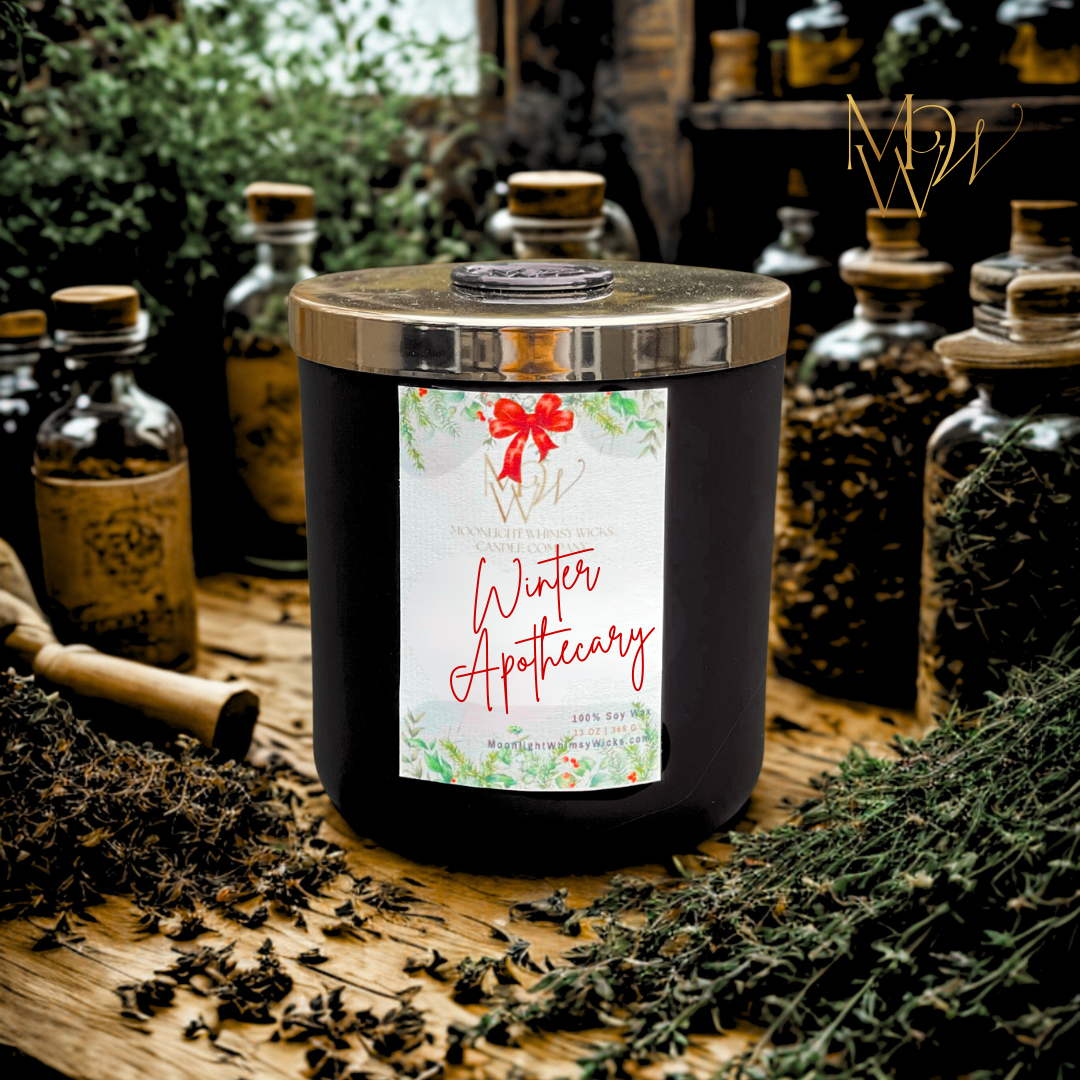 Winter Black Tea soy candle in matte black jar with wax-sealed gold lid, labeled “Winter Apothecary” by Moonlight Whimsy Wicks. Surrounded by dried botanicals, apothecary jars, and rustic wood tones for a cozy, dark academia-inspired holiday aesthetic.